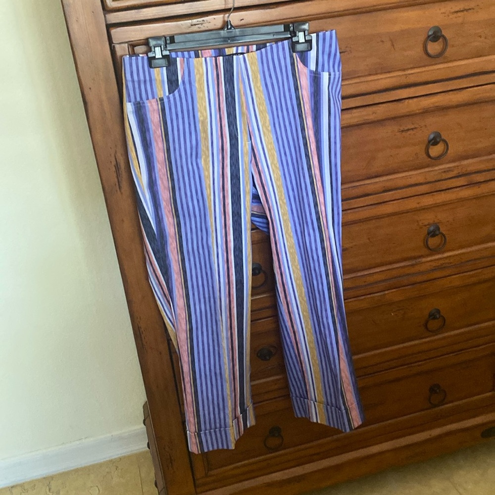 Cute pair of multicolored pants. 34” from waist to cuff. Super comfy. Washable.